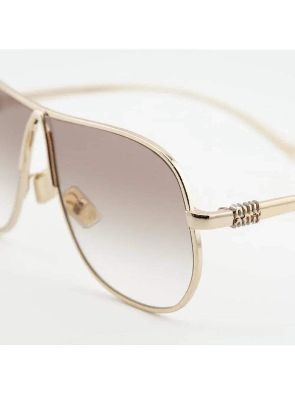 Miu Miu MUA56S 5AK90L Sunglasses Gold Geometric Frame, Brown Lenses